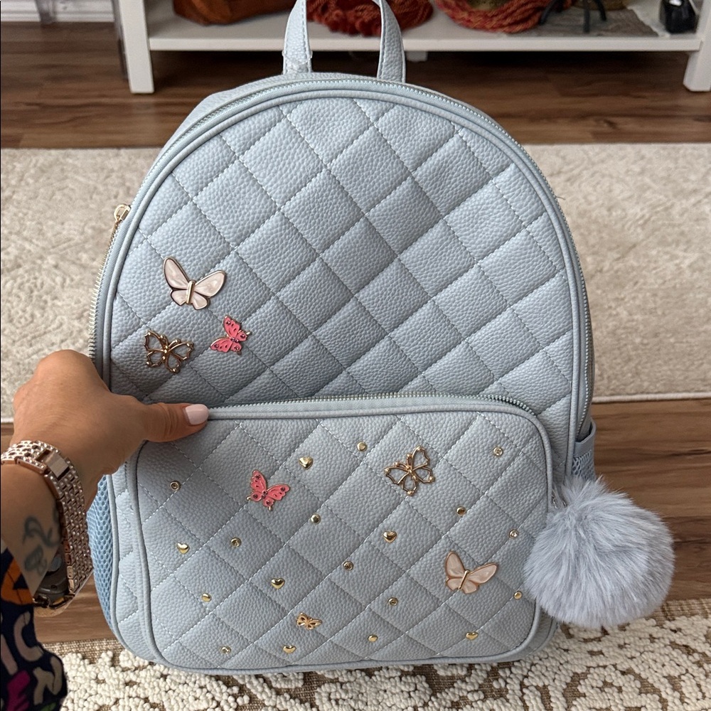 Under One Sky Quilted Gray Backpack with Butterfly Details